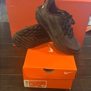 Nike Black Athletic Shoes with Mesh Upper